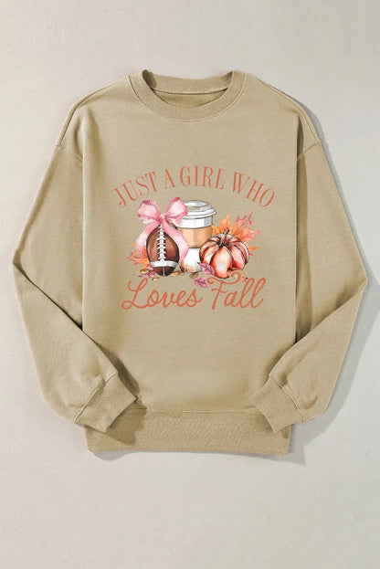 Flat lay of beige sweatshirt with fall graphic