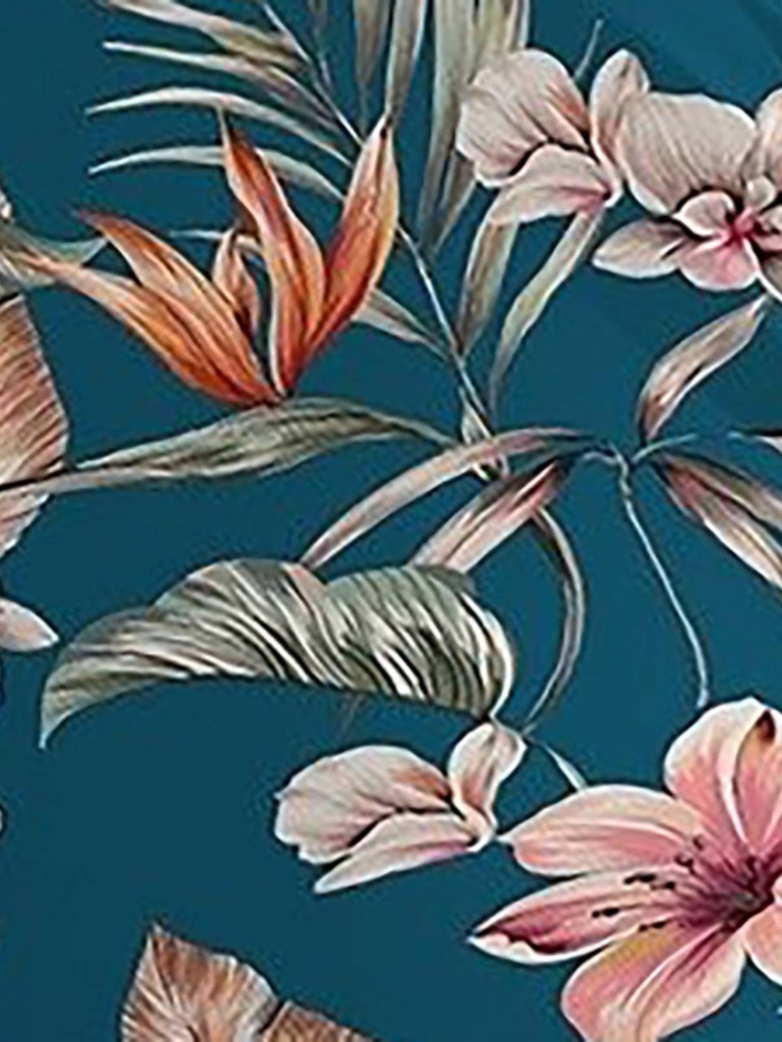 Close-up of floral pattern on one-piece swimwear.