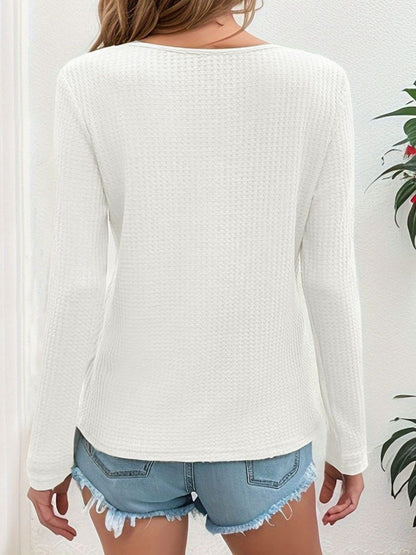 White waffle-knit V-neck top, back view