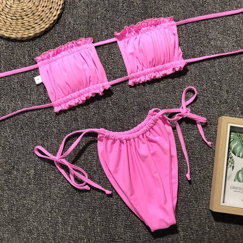 Pink frill trim ruched bikini set laid flat