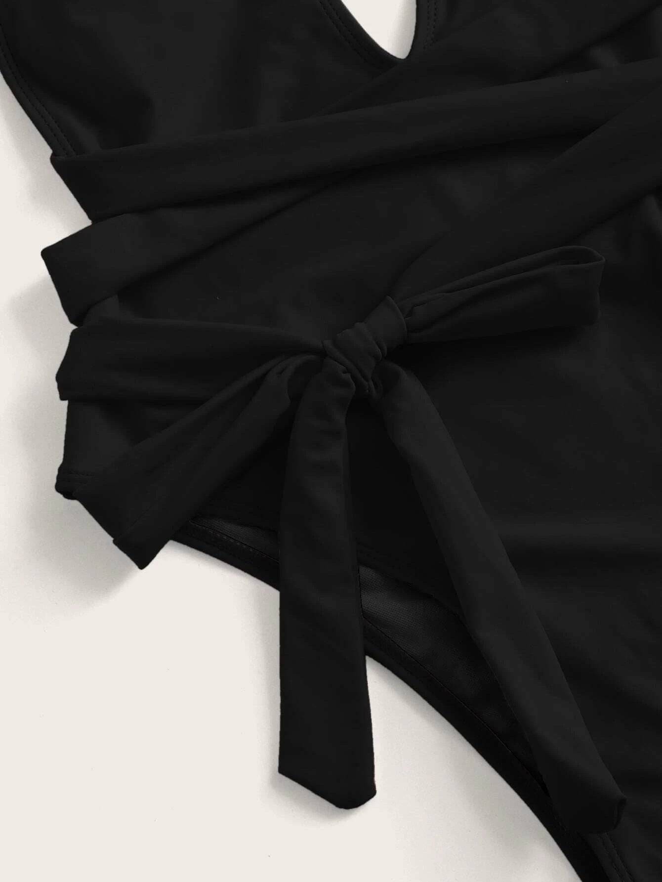 Close-up of black swimsuit ties