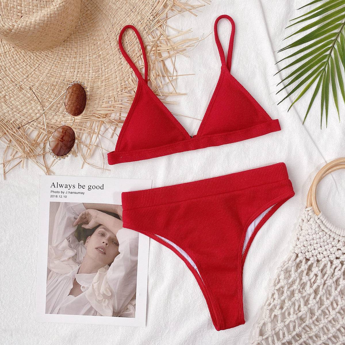 Red ribbed bikini set with stylish accessories