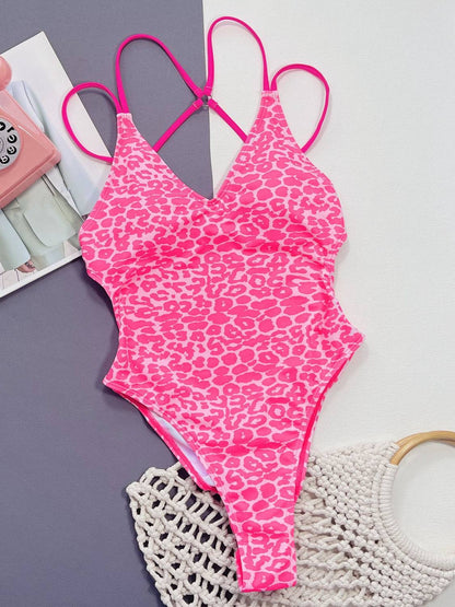 Flat lay of pink leopard one-piece swimwear