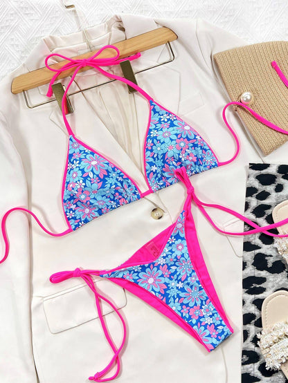 Floral bikini set displayed with a blazer and accessories