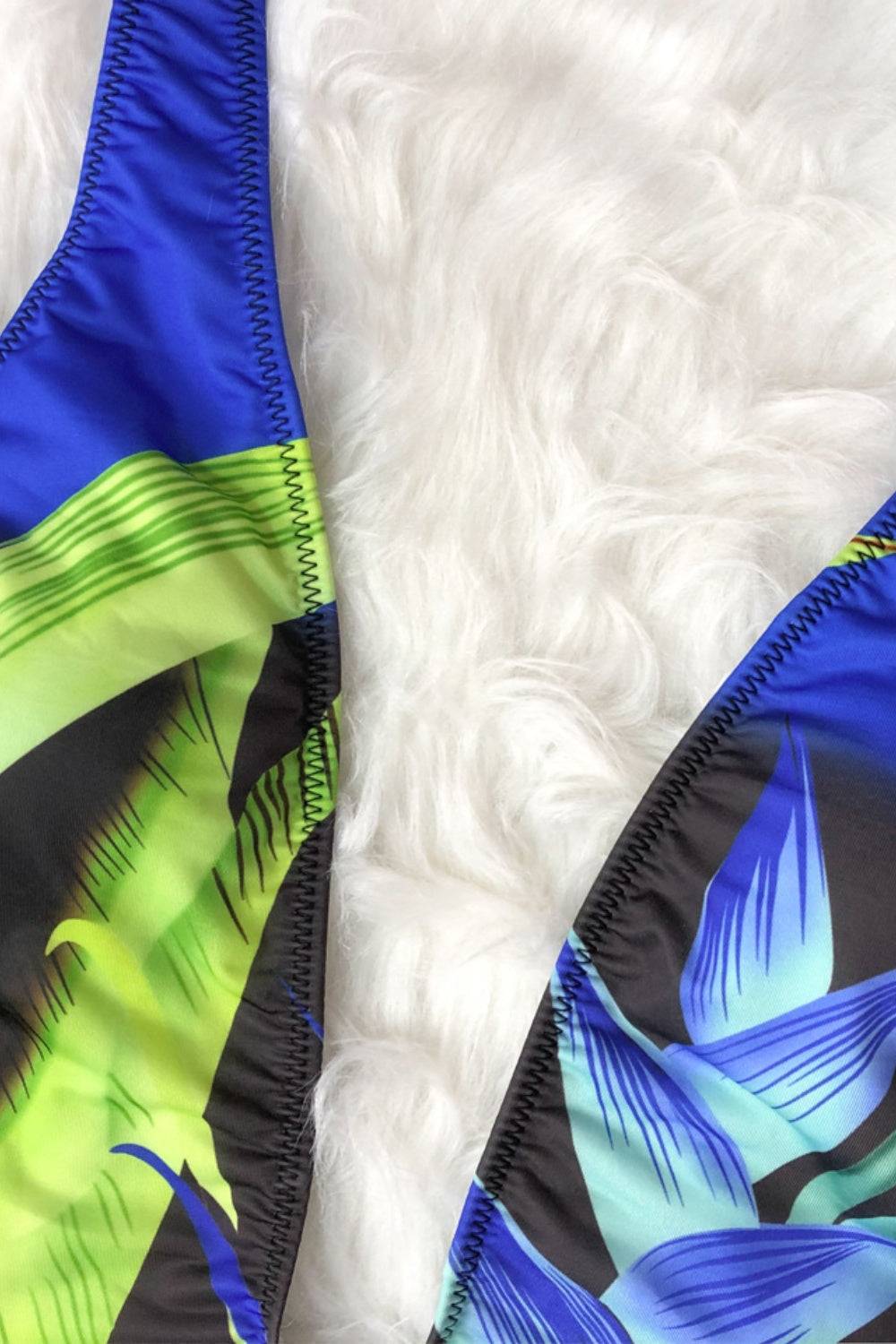 Close-up of blue and green printed swimsuit fabric