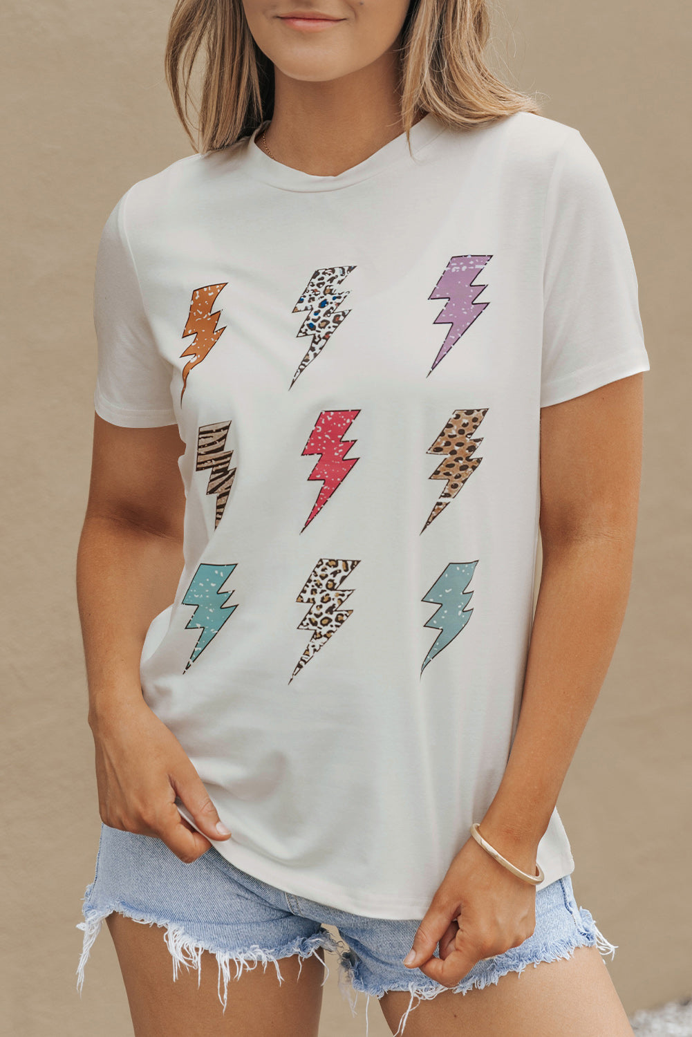 White T-shirt with colorful lightning graphic, front view