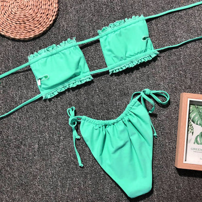 Green frill trim ruched bikini set flat lay