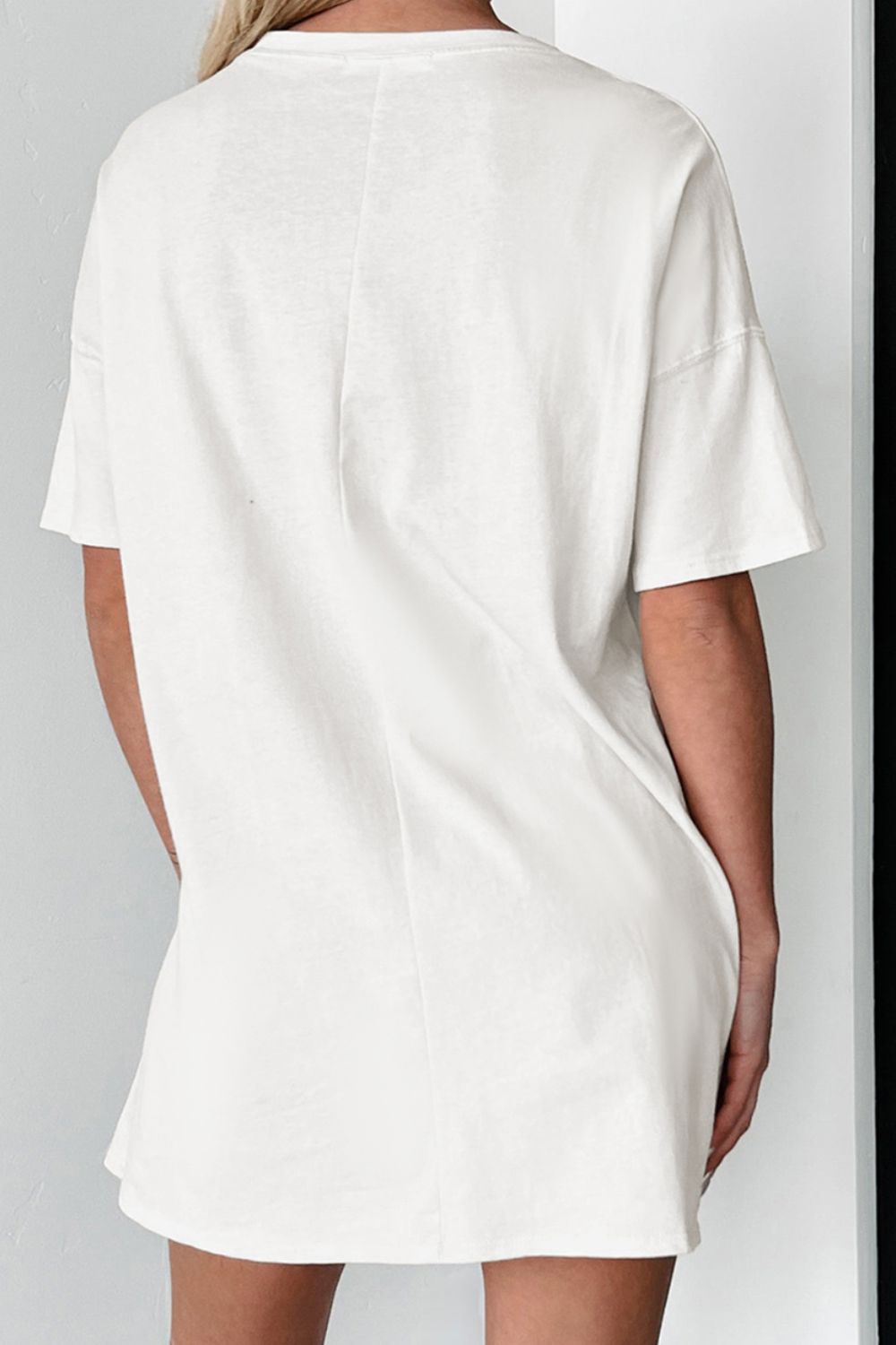 Back view of white T-shirt, round neck, short sleeves