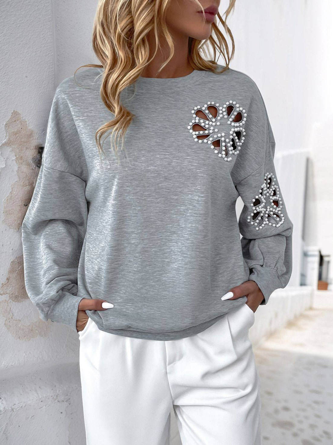 Gray sweatshirt with pearl cutout design, round neck, long sleeves