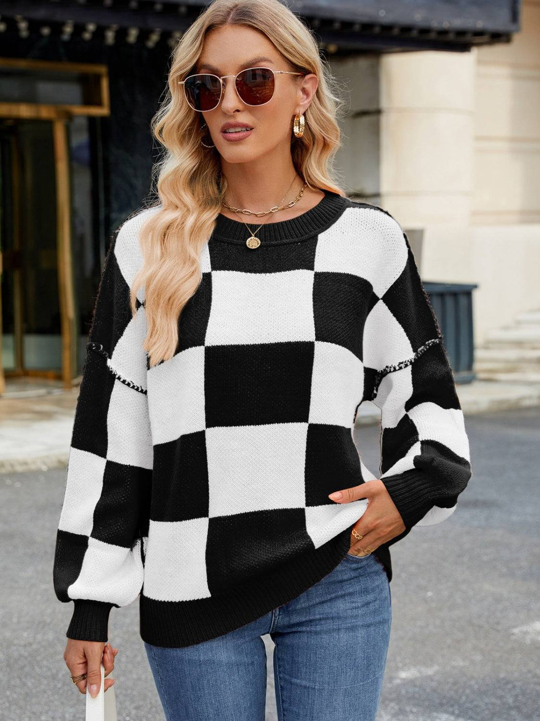 Black and white checkered round neck sweater