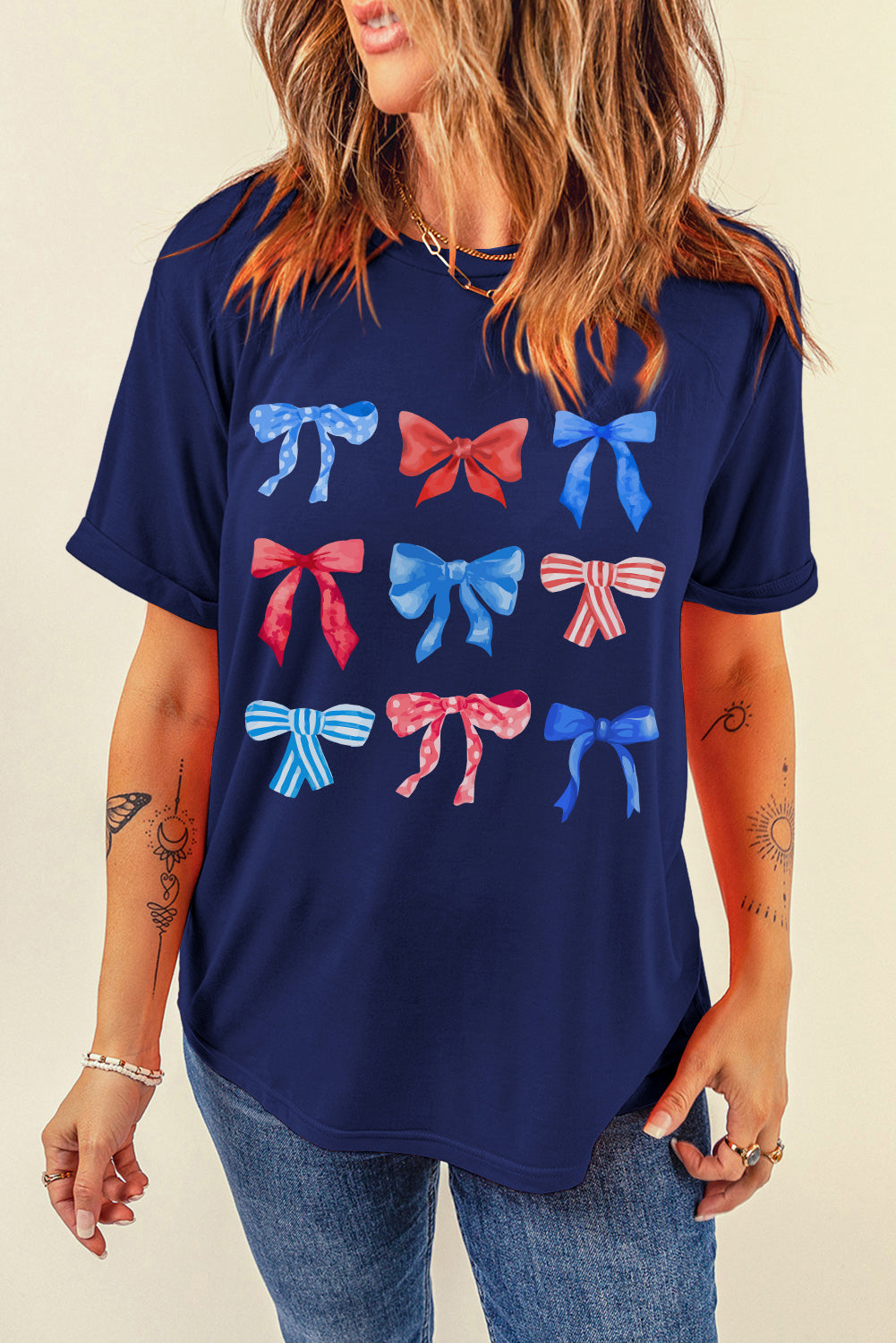 Navy T-shirt with colorful bow graphic design, front view