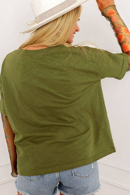 Back view of green faux two piece floral patchwork top