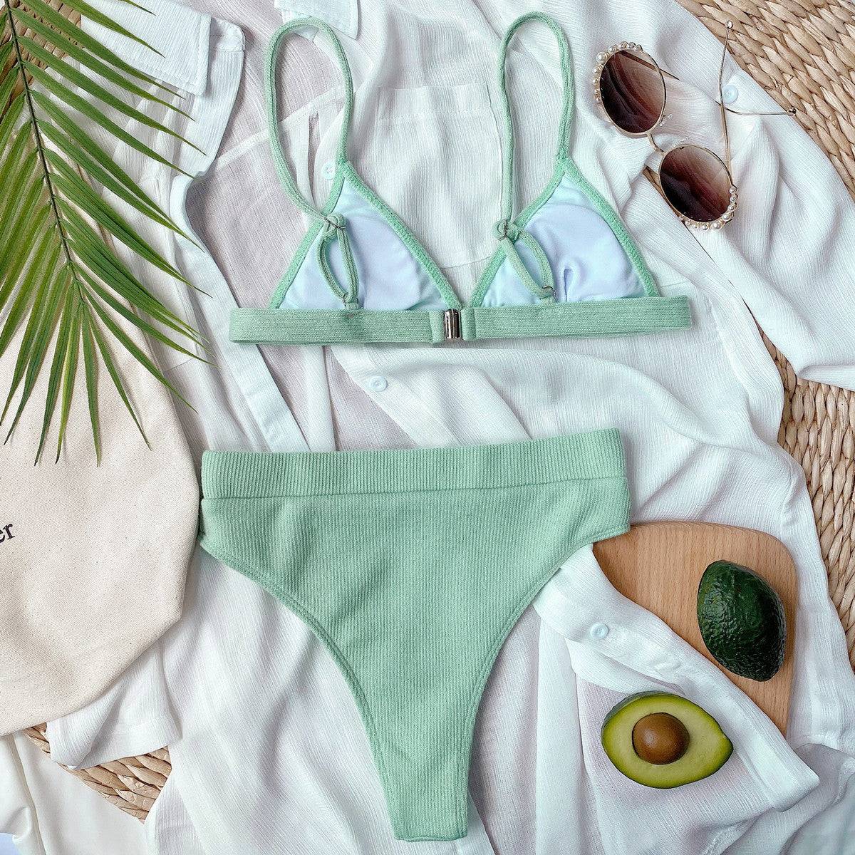 Mint green ribbed bikini set with avocado and sunglasses