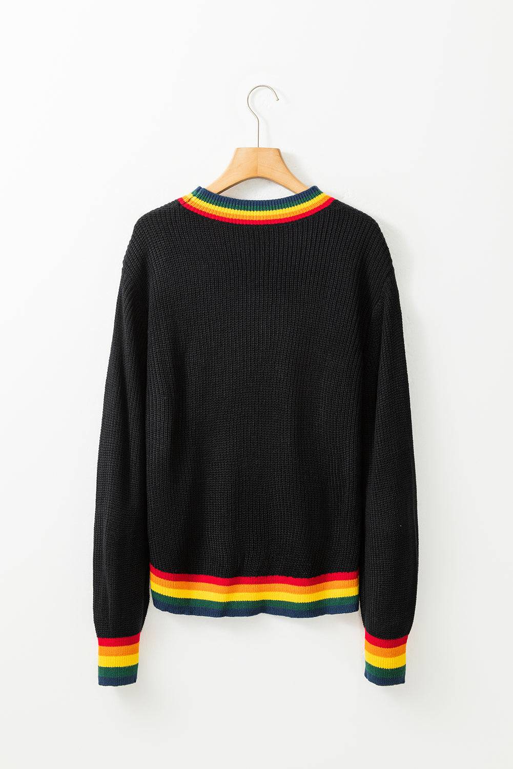 Back view of black sweater with rainbow trim