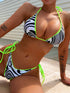 Zebra print halter neck bikini set with neon accents