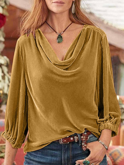 Gold cowl neck top with three-quarter sleeves