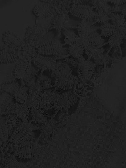 Close-up of lace details on black long sleeve t-shirt