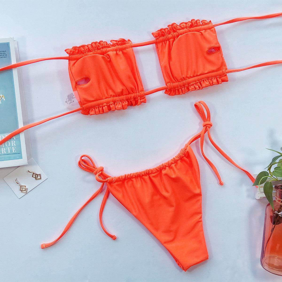 Orange frill trim ruched bikini set laid flat