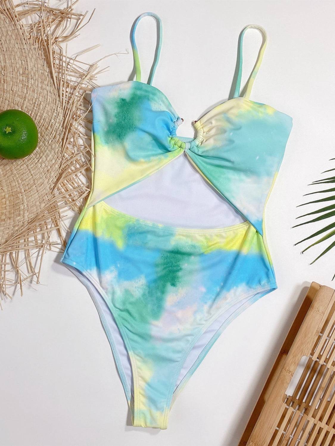 Flat lay of tie-dye cutout spaghetti strap swimwear