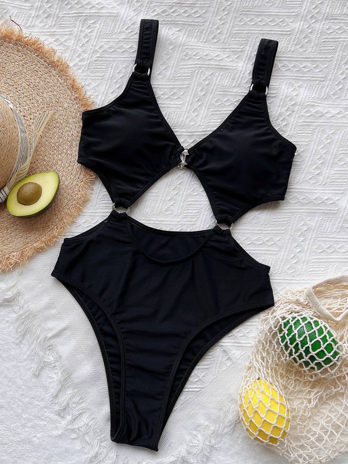 Black cutout plunge one-piece swimwear on display