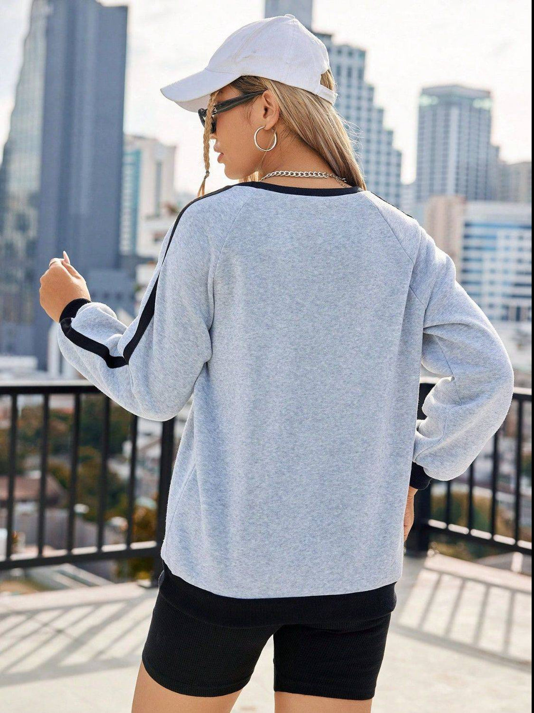 Front view of letter round neck long sleeve sweatshirt