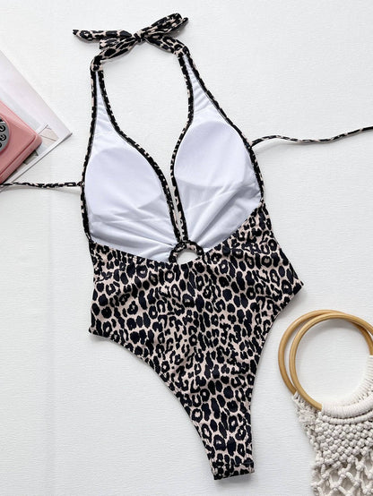 Inside view of leopard halter neck one-piece swimsuit with ring detail