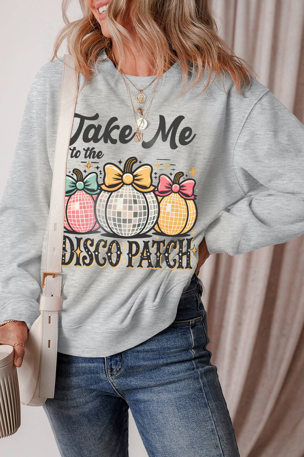 Graphic round neck long sleeve sweatshirt with disco patch design.