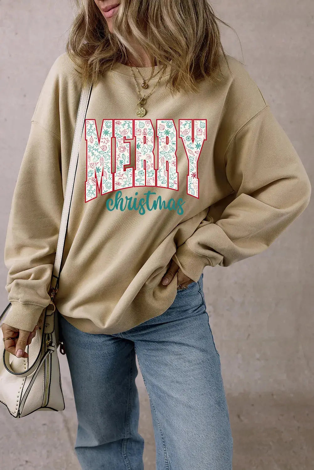 MERRY CHRISTMAS sweatshirt styled with jeans