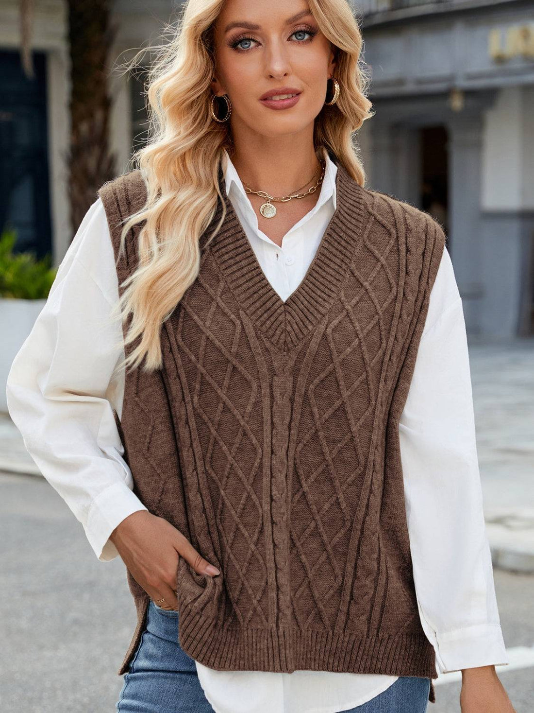 Brown cable knit V-neck sweater vest, front view