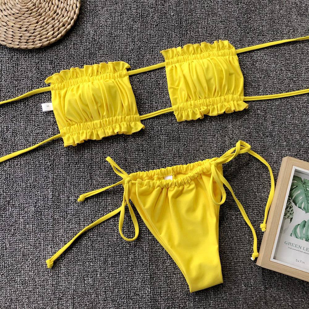 Yellow frill trim ruched bikini set laid flat