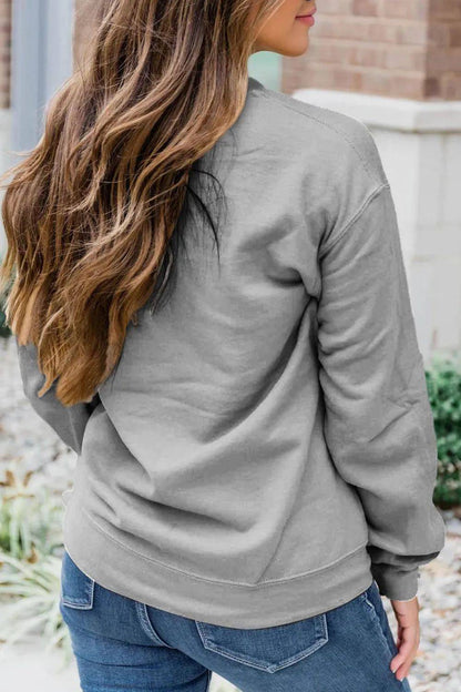 Back view of a gray long sleeve sweatshirt.