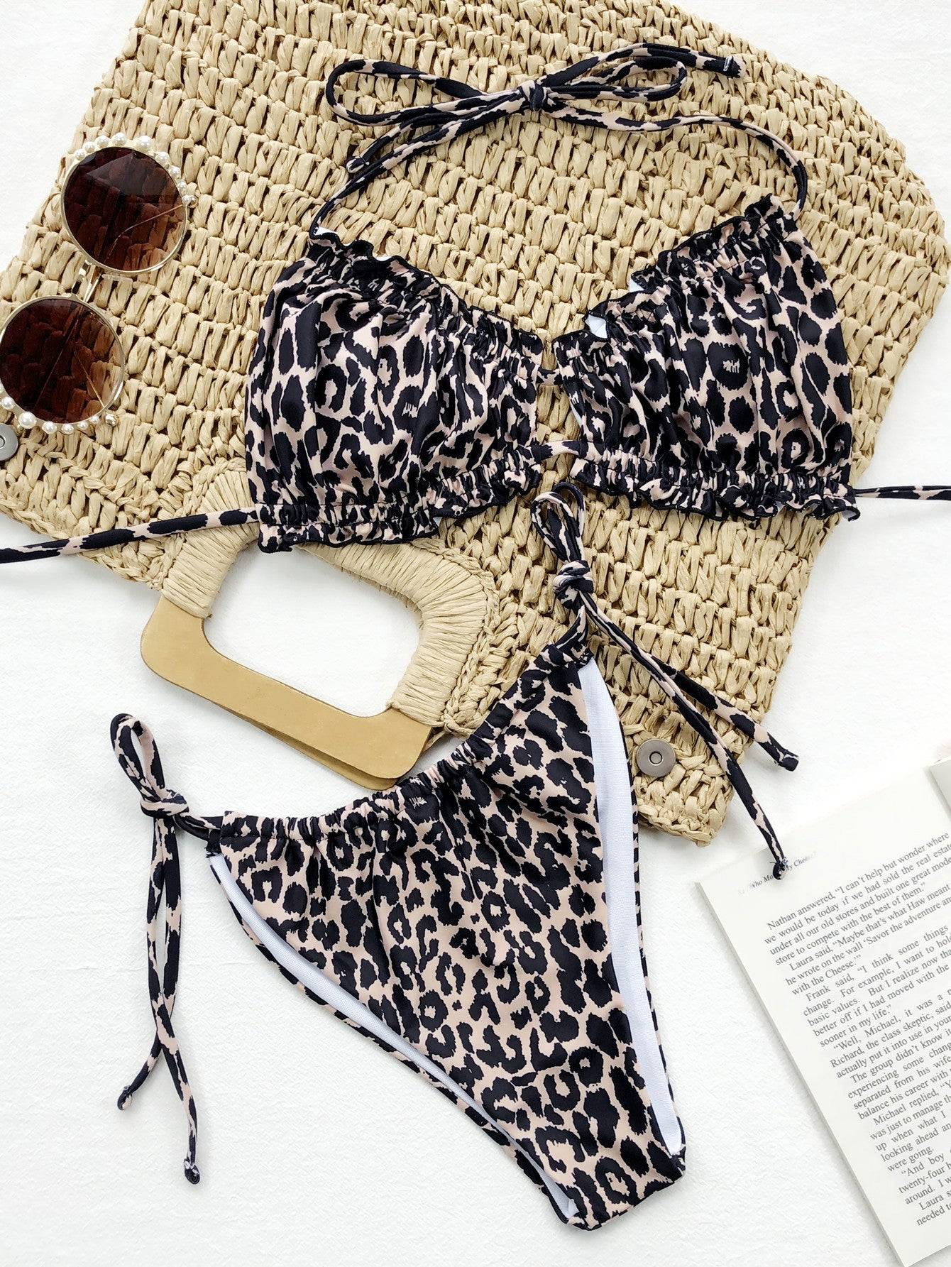 Leopard print bikini set displayed with accessories