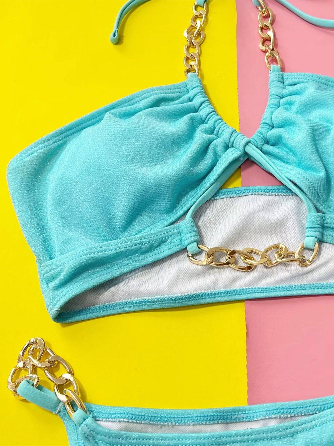 Close-up of chain detail on bikini top