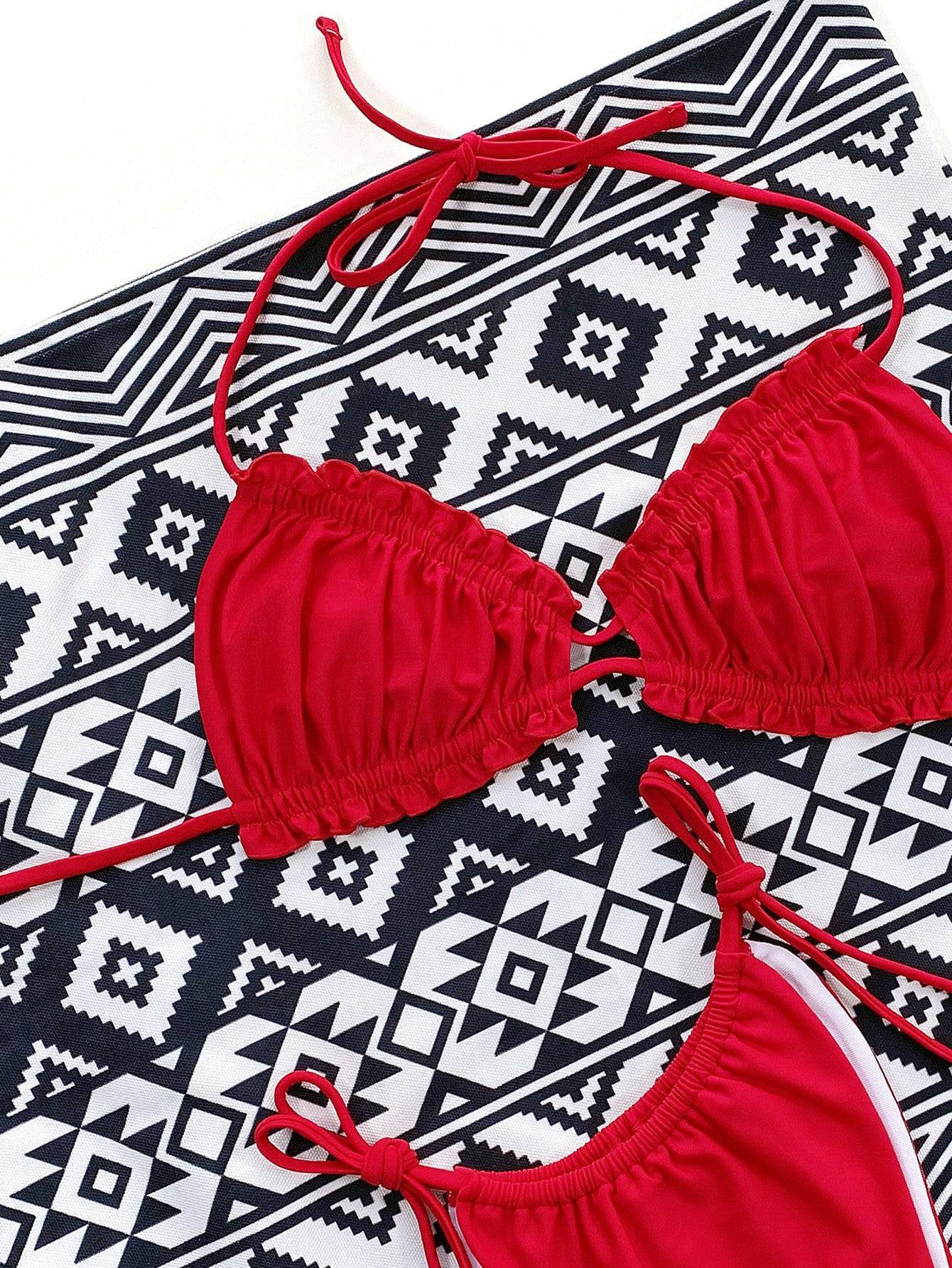 Close-up of red bikini top with frill details