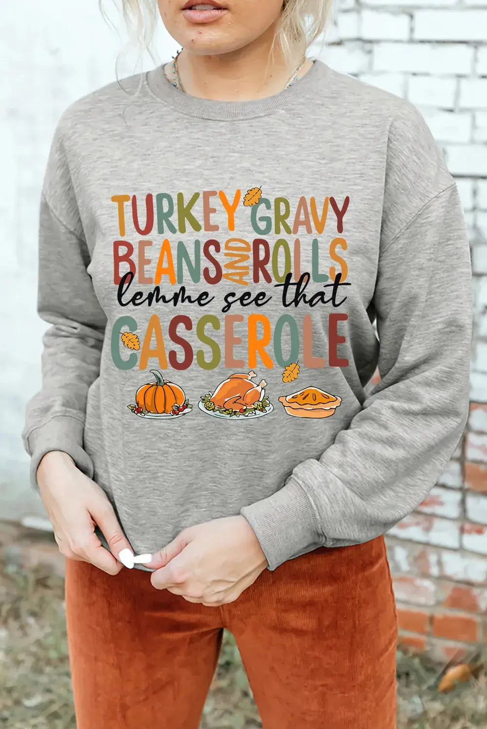 Thanksgiving-themed sweatshirt with festive lettering.