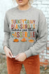 Thanksgiving-themed sweatshirt with festive lettering.