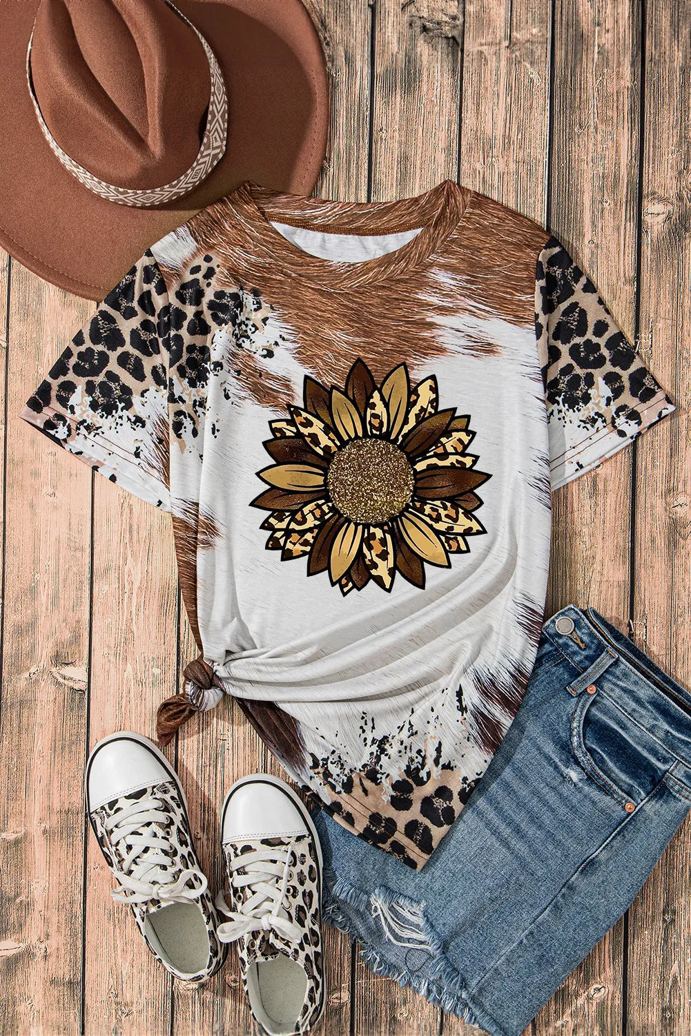 Sunflower graphic t-shirt styled with denim shorts and hat