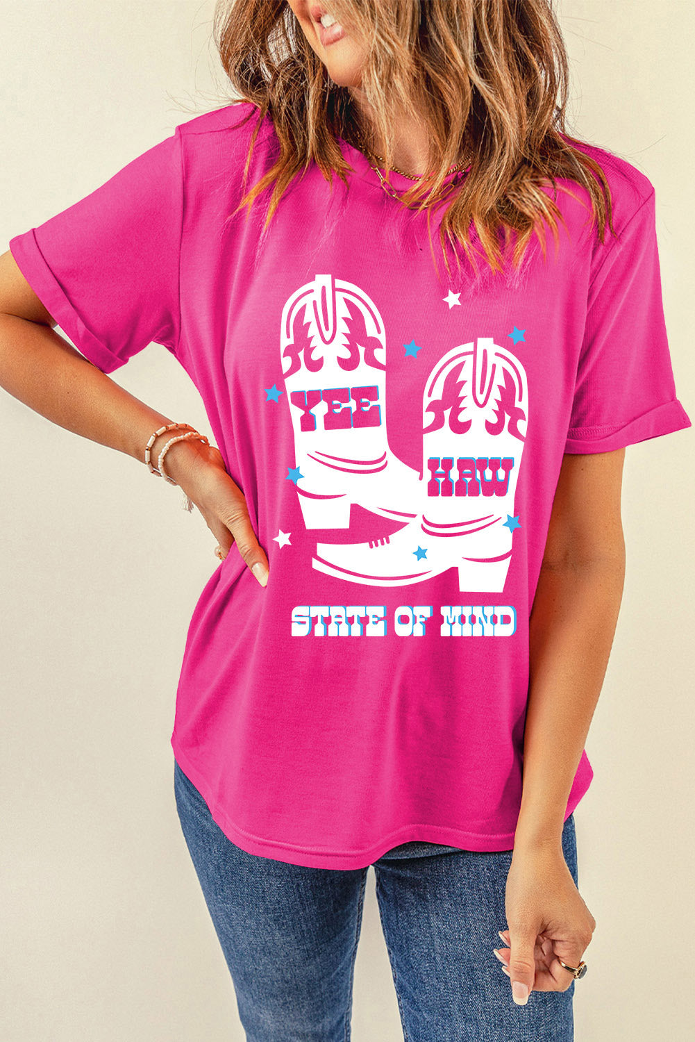 Pink T-shirt featuring Yee Haw cowboy boots graphic