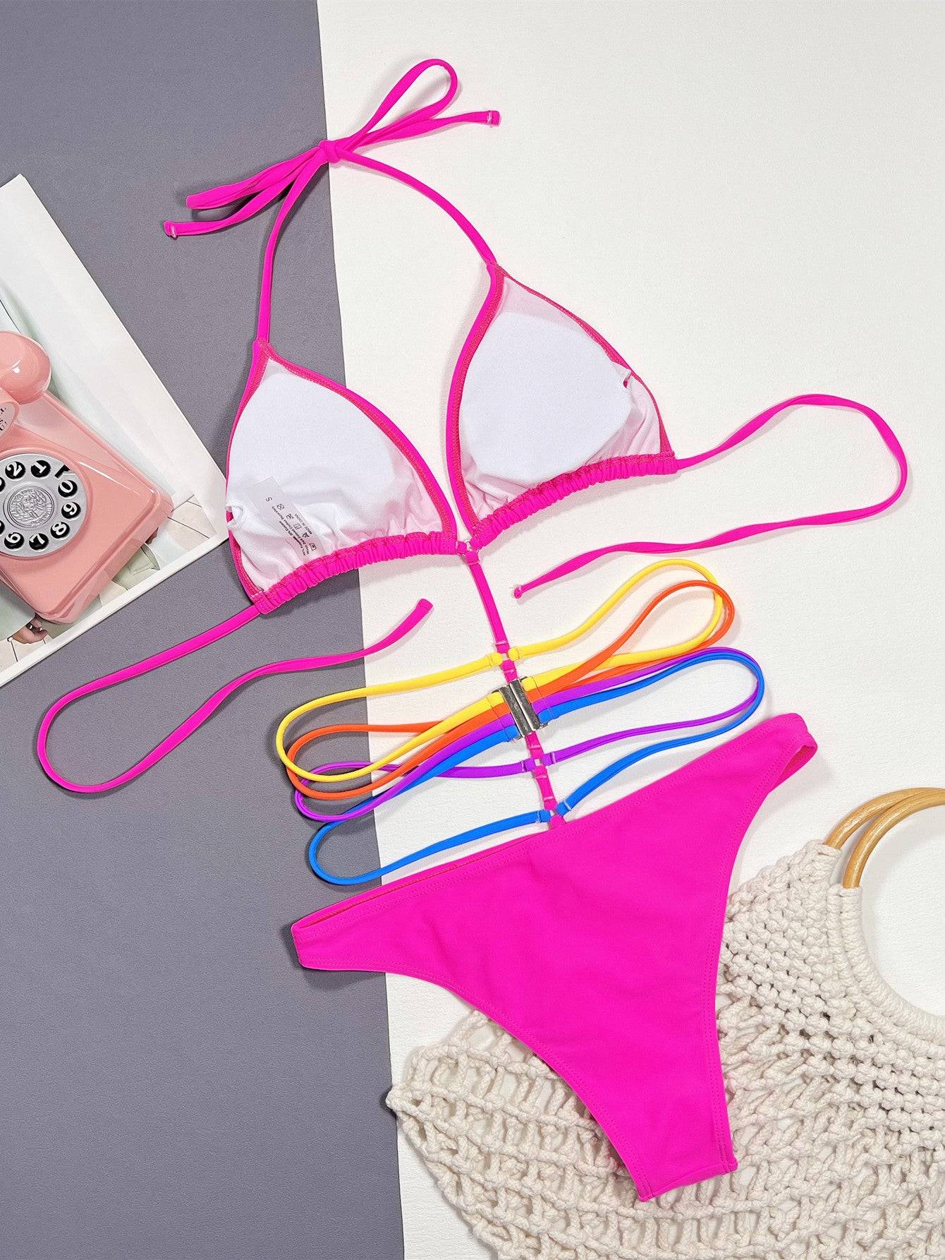 Inside view of pink strappy halter neck swimsuit