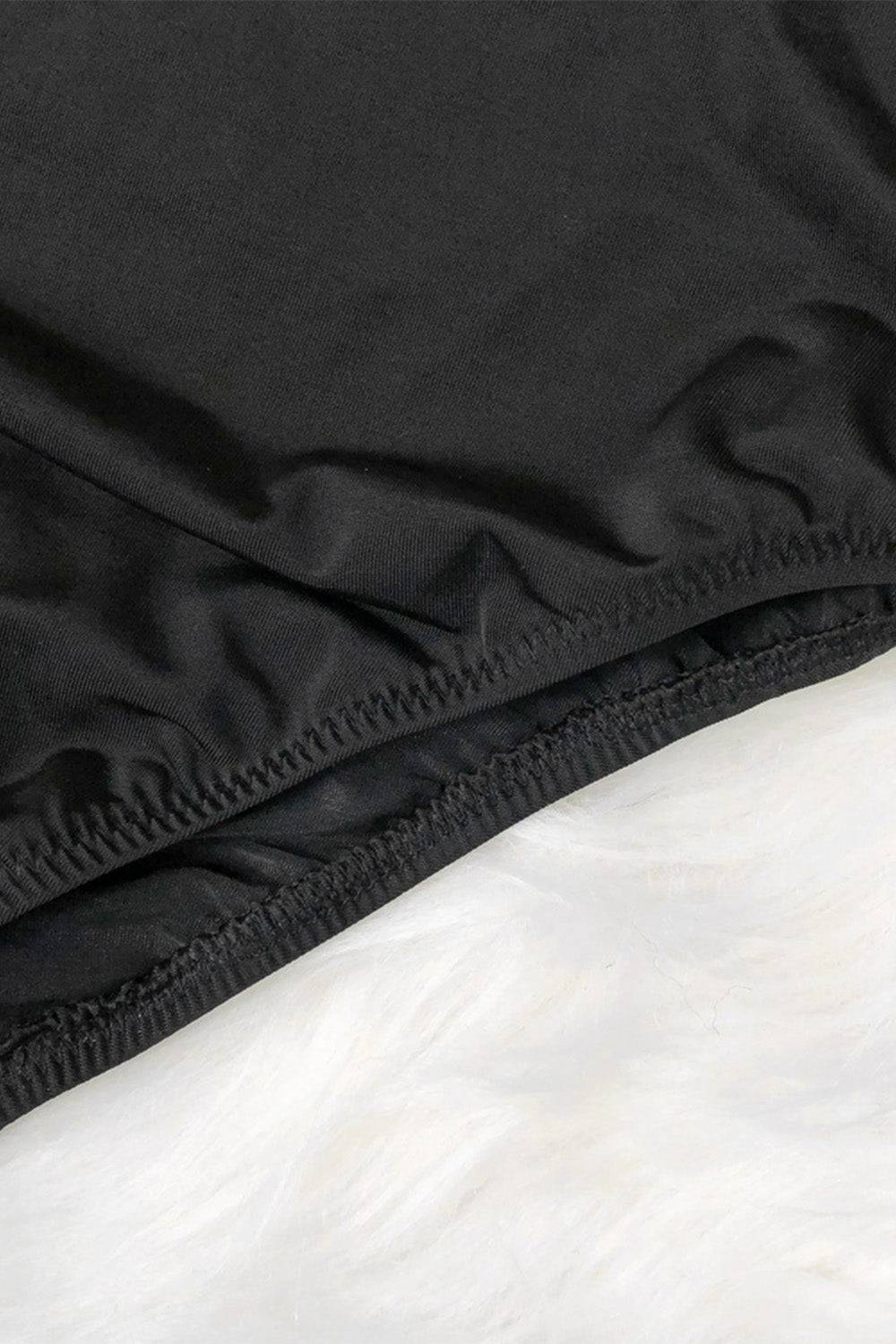 Detailed view of black swimwear fabric texture