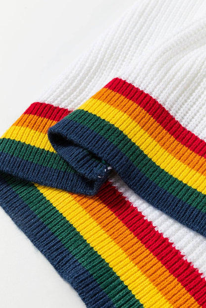 Close-up of white sweater hem with rainbow trim