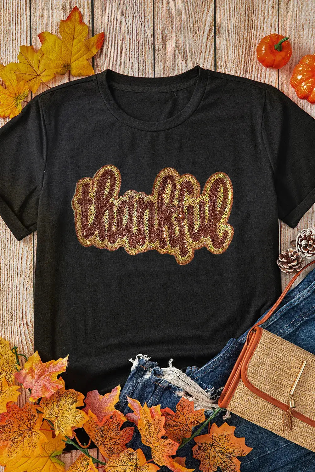 THANKFUL sequin T-shirt styled with autumn leaves and accessories