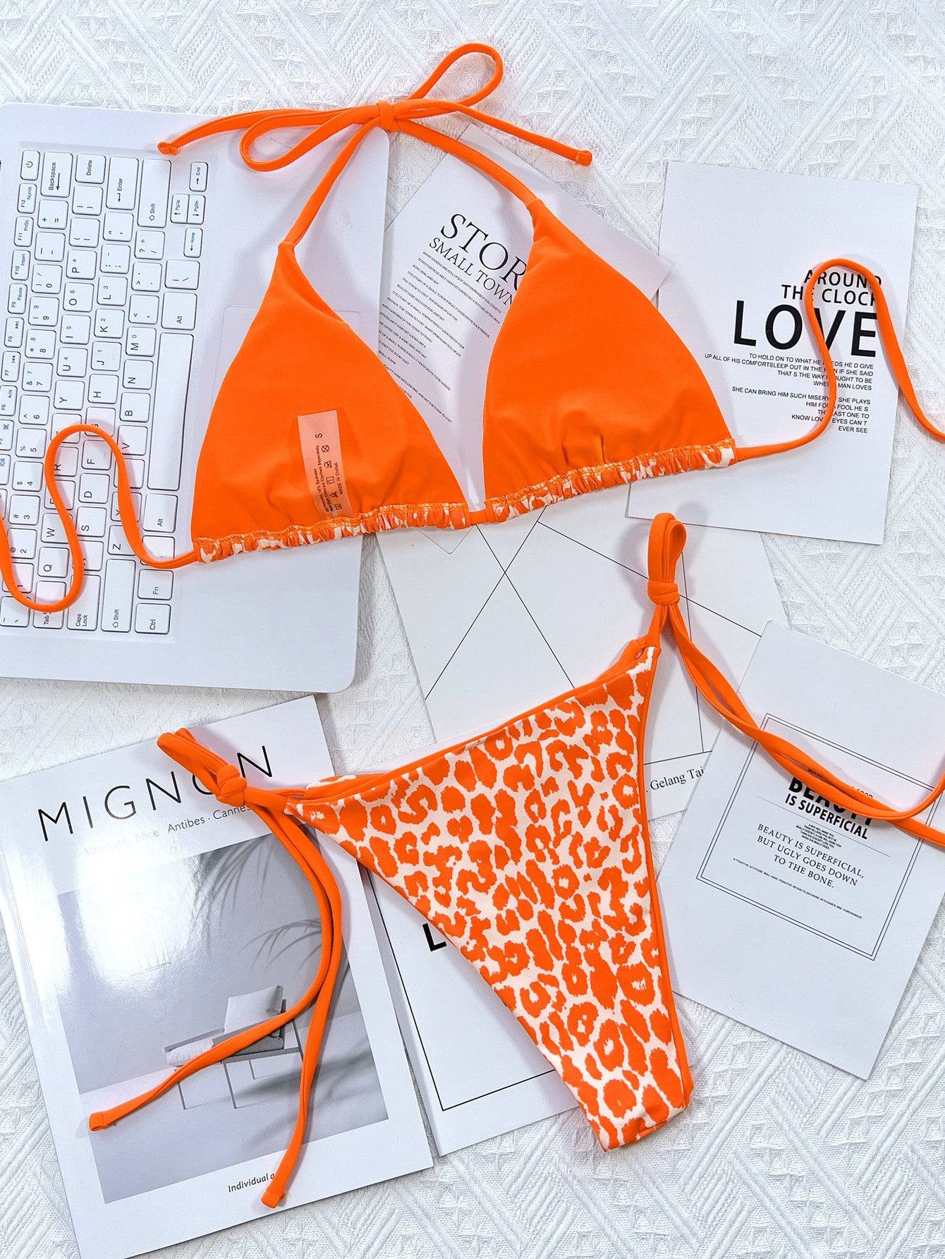 Close-up of orange leopard print bikini top