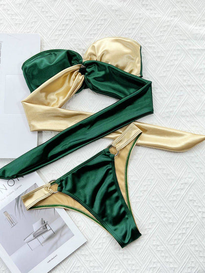 Green and gold bikini set with ring detail on display