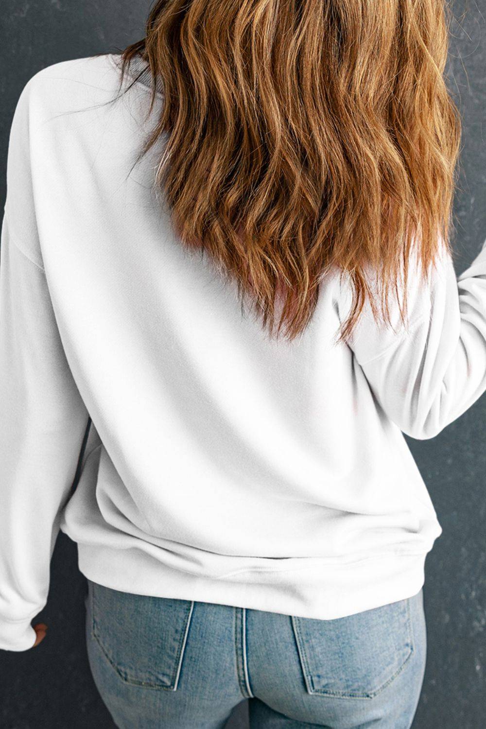 Back view of white long sleeve sweatshirt