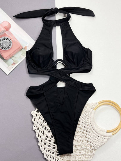 Flat lay of black cutout halter neck one-piece swimwear