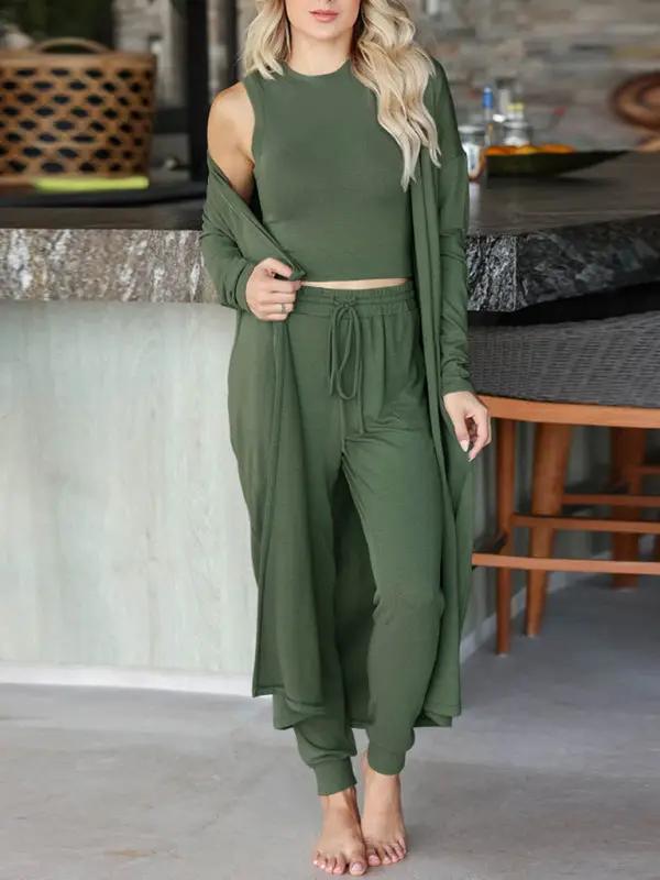 Green knitted jacket, vest, and trousers set for women