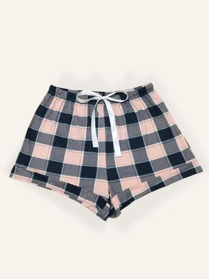 Plus size plaid short pajama pants with white drawstring.