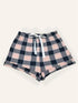 Plus size plaid short pajama pants with white drawstring.