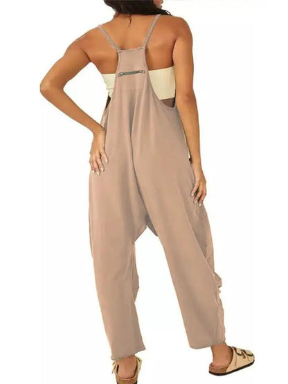 Beige V-neck suspender pocket jumpsuit, back view